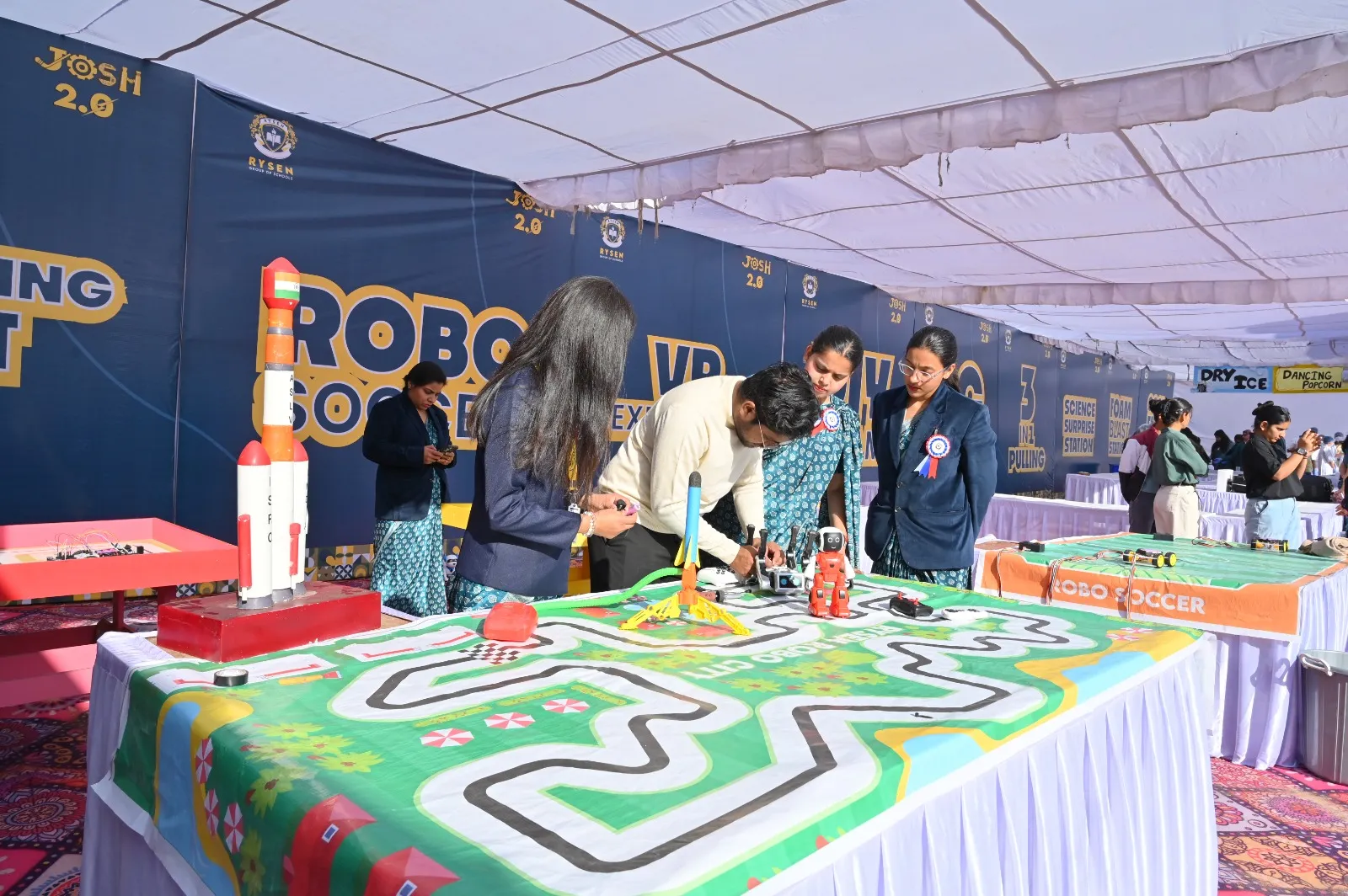 Robotics arena and coding challenge activities at JOSH 2.0 innovation event organized by Rysen School Virat Nagar Bikaner.
