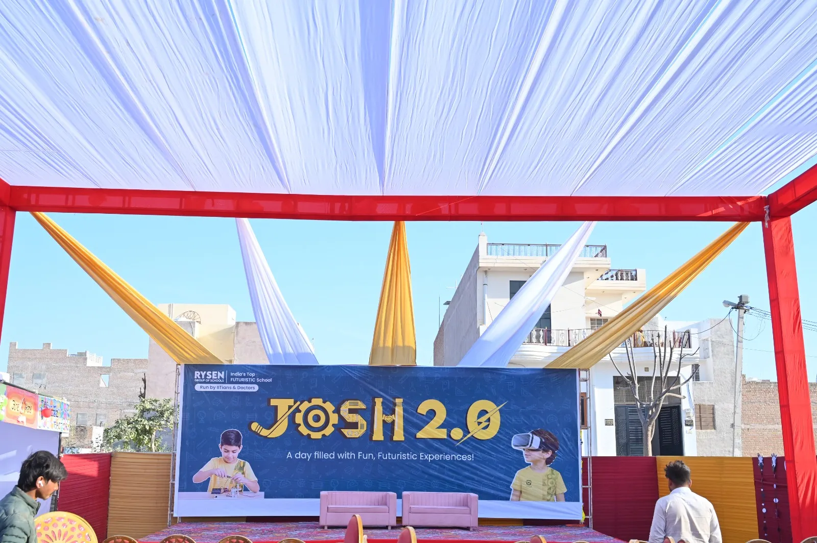 Entrance and main stage setup of JOSH 2.0 at Rysen School Bikaner showcasing experiential learning, innovation, robotics, drone flying, and creative student activities.